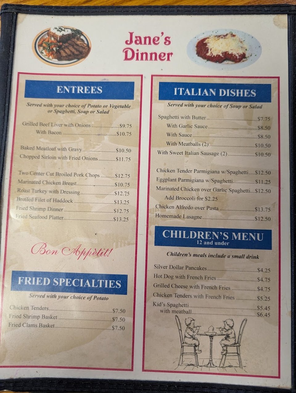 Printed menu pages with diner breakfast and sandwich sections.